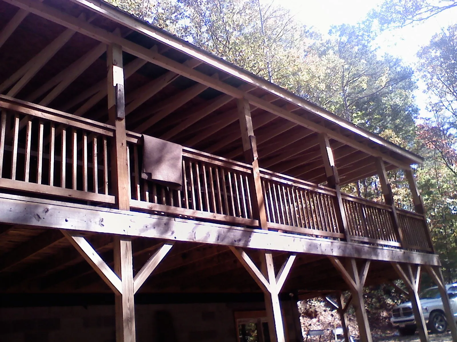Timber framing under a new elevated porch and deck — Roof Leak Repair in Danvers by Roofing Brothers